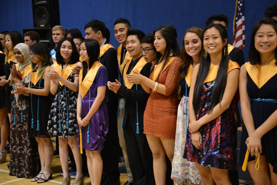 Seniors are recognized for their accomplishments through high school. Photo credit: Tue Duong
