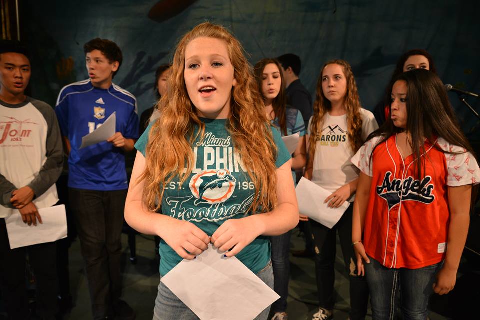 Mackenzie Sheppard ('14) rehearses for the concert with the help of her friends.