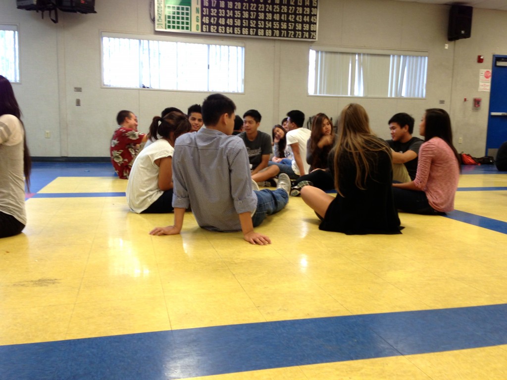 Link Crew leaders sit in the cafeteria during their training session. Photo credit: Demetria Ma