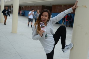 Audrey Vu ('16) poses with her homecoming ticket Photo by Kristie Hoang