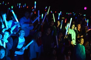 Students, staffs and parents packed the bowl in the second annual night assembly, the Glow Show. Photo by Ashley Le