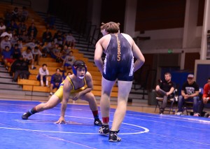 Hieu Nguyen ('15) faces the challenge from an Oilers wrestler. Photo by Ashley Le.