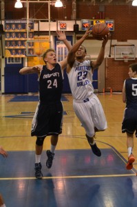 Jordan Venters ('14) drives the ball in the fourth quarter. Photo by Tue Duong 
