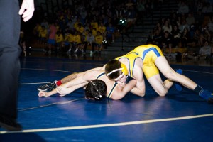 Carson Ayres ('17) takes down his opponent.