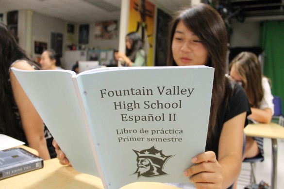 A Spanish 2 student studies her vocabulary in one of the new workbooks. Photo by Andy Kim
