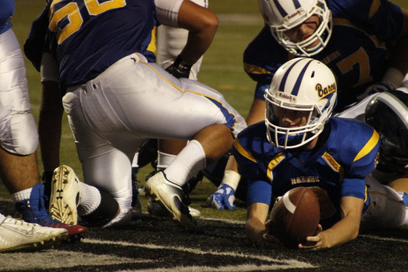 #8 Quarterback Chad Olberding ('16) dive through the crowd to get the the touchdown.