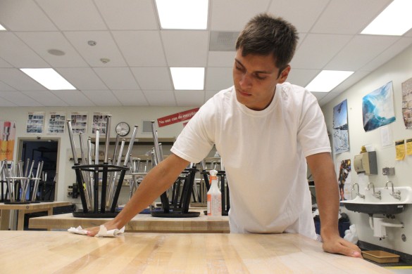 Student Jeff Wright (12) cleaning to clear detonations last minute for homecoming. Photo by Chris Wells