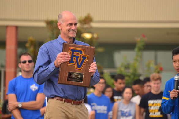 Mr. Herzfeld is presented with an FVHS plaque. Photo credit: Ashley Le