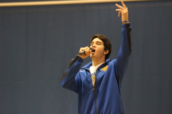 Chris Meyer surprises the audience with his original rap . Photo by Chris Wells.