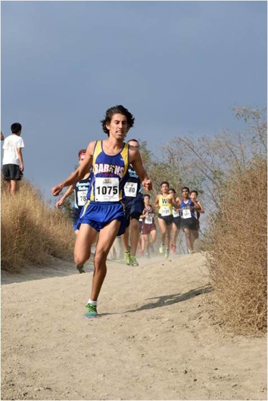 Galyn Nash ('15) uses shoots down Reservoir Hill with 600 meters to go.