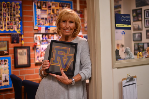 Guidance specialist Monica Whitman poses with the FV letterman she received from an FVHS alumnus. Photo by Ashley Le. 