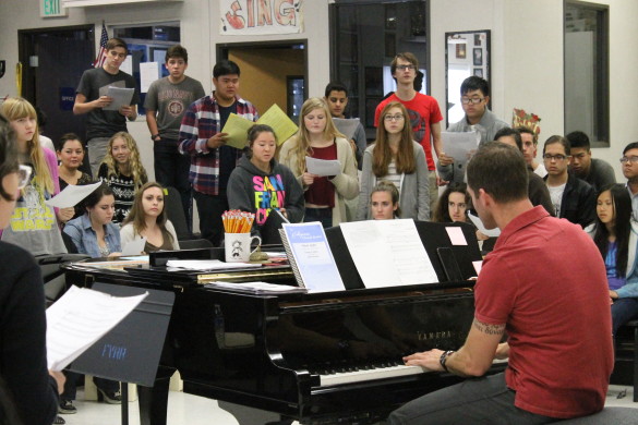 Choir practices for there upcoming winter concert.
