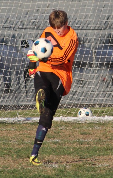 Goalkeeper Slater Kucera ('17) kicks the ball away from the goal 