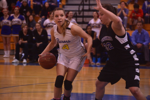 Ari Jacobsen ('15) attempts to overcome a challenge from a Wild Cat. Photo by Ashley Le.