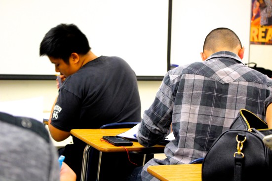 Students doing classwork in class. Photo by Heather Kim. 