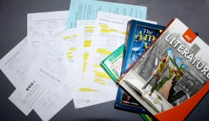 A student's homework and textbooks. Photo by Heather Kim. 