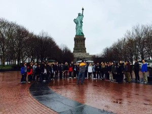 Concert Choir performs the Star Spangled Banner at the Statue of Liberty in New York. Photo Credit: Zury Ramirez