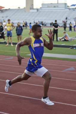 Nicholas Malone ('16) powers down the straightaway during the varsity boys 200m sprint. Photo courtesy of Noah Carr. 