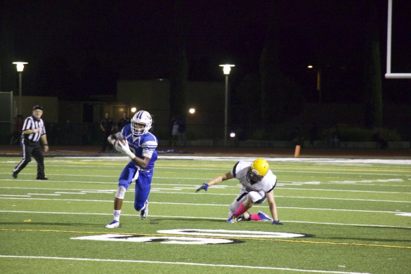 Kent Swift ('16) intercepts the ball from the Vikings. Photo by Sandra On. 