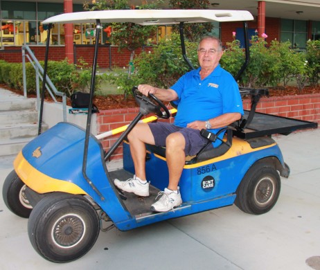 Supervision staff member Craig Johnson cruising around in his usual golf cart. Photo by Julia Pacis