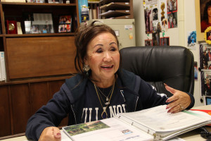 Young animatedly describes her adventures in over 40 years at FVHS. Photo by Yasir Khaleq