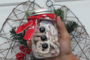 A mason jar designed to look like a snowman.