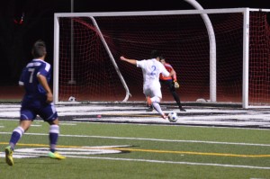 Zachary Young ('17) prepares to rifle a shot at goal. Photo by Yasir Khaleq. 