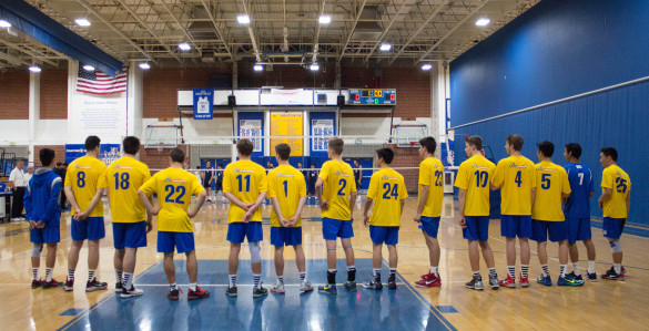 Boys varsity volleyball stands on the back line, waiting to begin their match against St. John Bosco. Photo by Michelle Nhi Nguyen
