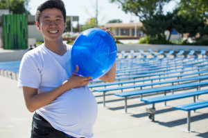 Ken Sakata ('18) humorously shows off his balloon before releasing it.