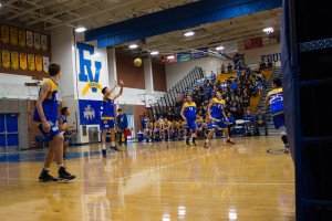 Outside hitter Downey Huynh ('17) handles a tough serve receive from Marina.