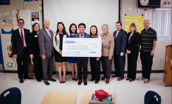 Justin Nguyen ('16) accepts the Cspan award for second place on behalf of himself and Leah Philips ('16). Photo by Viet Vu 