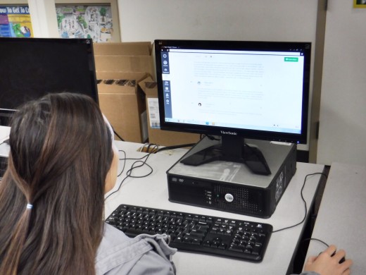 Laura Le ('18) finishes her online assignments. Photo by Isabella Purdy. 