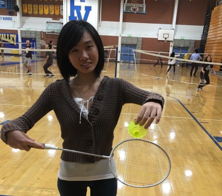 President of Badminton Club, Quynh Tran ('18) poses with her racquet and shuttlecock with high hopes for badminton club to succeed. 