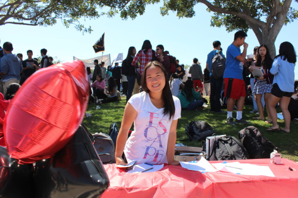 Co-presdient Sarah Kwok ('18) gets ready during Club Rush. Photo by Ivy Duong. 