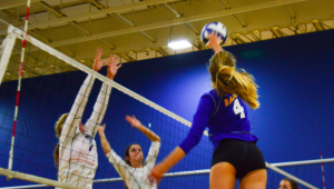 Dana Hills blocking a potential spike against FVHS #4. Photo by Yasir Khaleq, Staff Photographer.