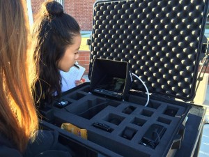 BBN co-producer Cathy Bui ('17) reviews the video of just-recorded footage on a monitor. Photo courtesy of Karen Kim and Christina Tran.