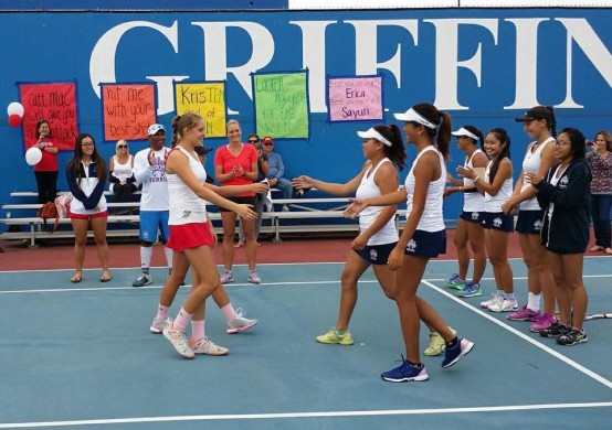 Clarissa Htay ('17) and Vikki Nguyen ('18) shakes hands with no. 2 doubles from Los Al before the match. Photo provided by Perry Htay