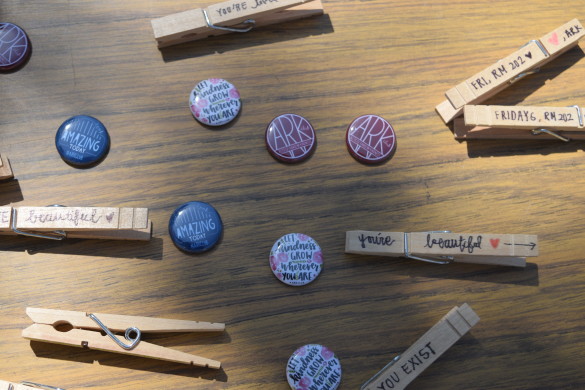 ARK spreads words of cheer and positivity thought their hidden messages and pins. Photo by Jamie Pham.