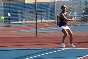 Brie Lay ('17) centers herself to retaliate the ball to the opposing court. Photo By Calvin Tran. 