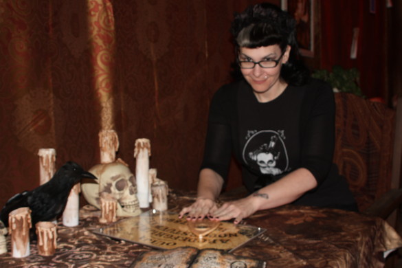 Nicole Watson communicates with surrounding spirits on her Ouija board. Photo by Calvin Tran